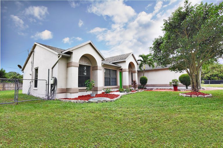 Photo by Mar10Photography, front yard shot of property at port Saint Lucie